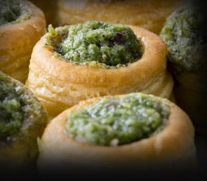Little puff pastries with escargots