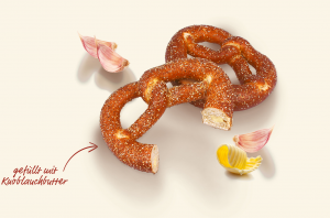 Pretzel filled with garlic butter fully baked