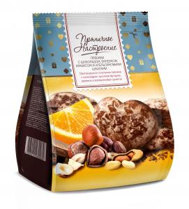 Glazed gingerbread cookies with chocolate, hazelnuts, peanuts, and candied orange (Copy)