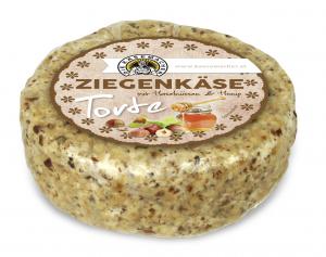 Goat`s milk cheese tart with honey and hazelnut