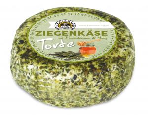 Goat`s milk cheese tart with honey and pumpkin seeds