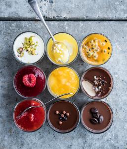 Single served desserts in glass and mini plastic cups