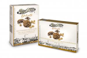 BISCUITS FILLED WITH HAZELNUT CREAM, COVERED WITH MILK CHOCOLATE AND CARAMELIZEDF HAZELNUT