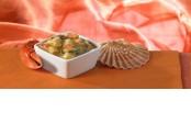 Cassolette of scallops and lobster in shellfish sauce
